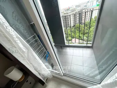 Cozy balcony with city view from high-rise apartment