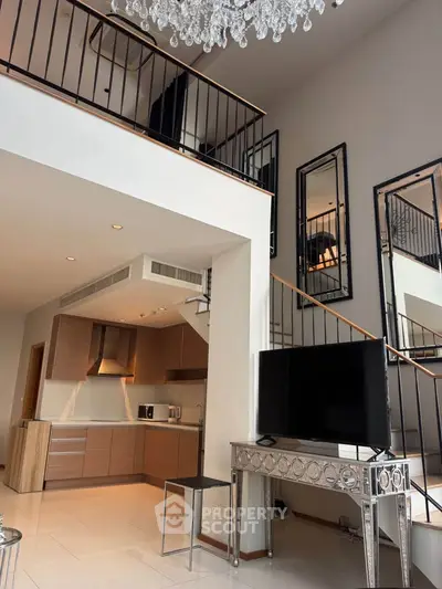 Modern loft apartment with open kitchen and stylish decor