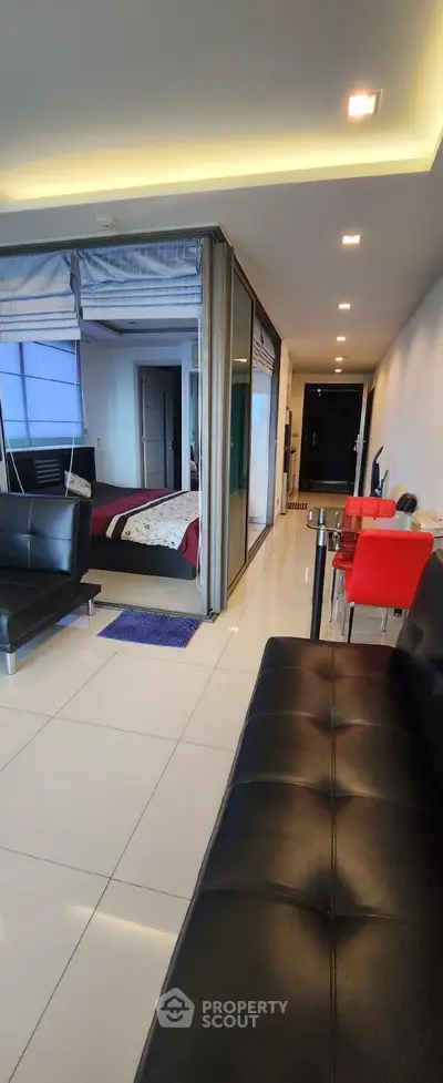 Modern open-concept living space with sleek furniture and stylish decor
