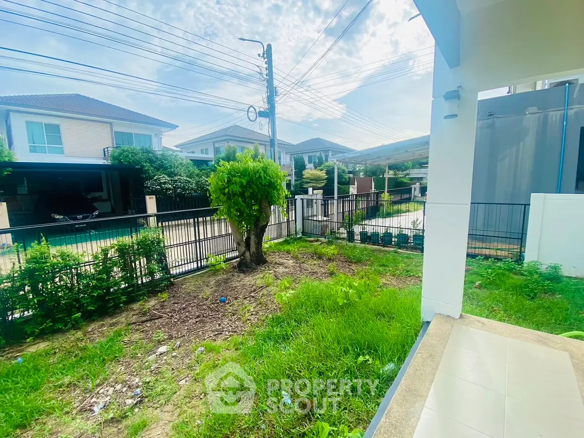Charming suburban home with lush garden and spacious outdoor area, perfect for family living.