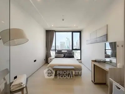 Modern bedroom with city view, featuring minimalist decor and large windows for natural light.