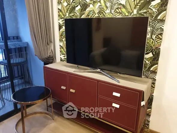 Stylish living room with modern TV setup and chic decor