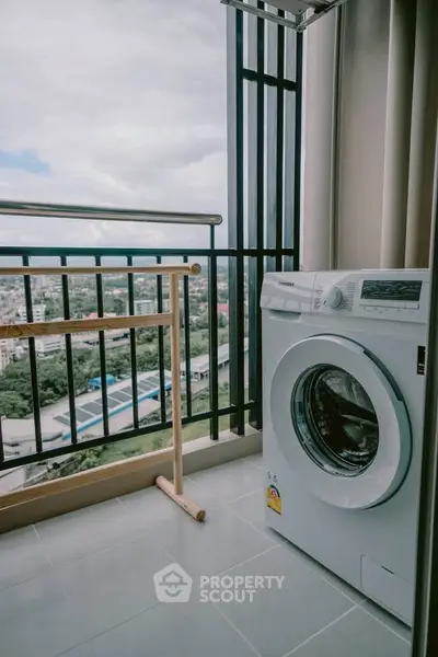 Modern balcony with washing machine and stunning city view