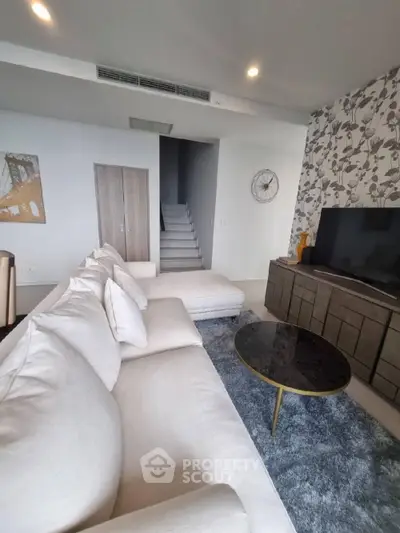 Modern living room with stylish decor and comfortable seating