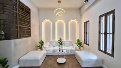 Modern living room with stylish lighting and elegant decor