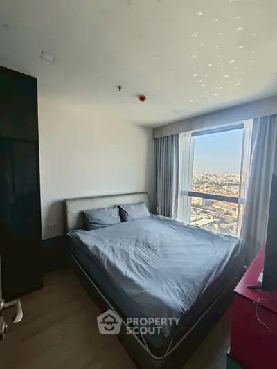 Cozy bedroom with city view and modern decor