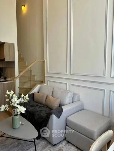 Modern living room with cozy sofa and elegant decor in a stylish apartment