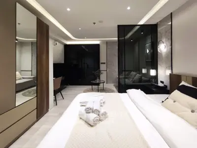Luxurious modern bedroom with elegant decor and ambient lighting