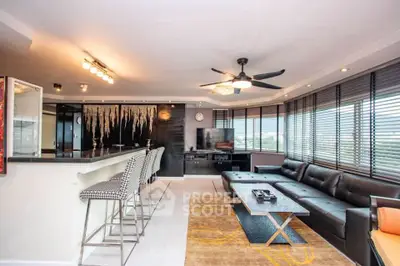 Spacious modern living room with sleek design and panoramic windows