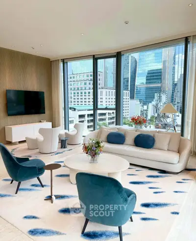 Luxurious modern living room with stunning city view, elegant furniture, and floor-to-ceiling windows.