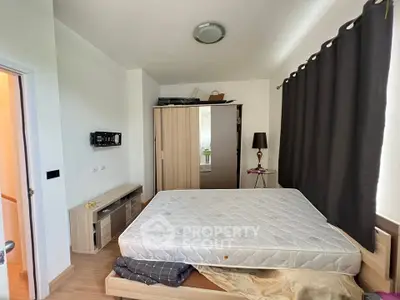 Cozy bedroom with modern furniture and natural light