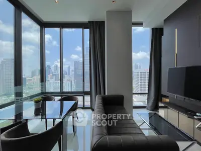 Modern living room with panoramic city view and sleek furniture