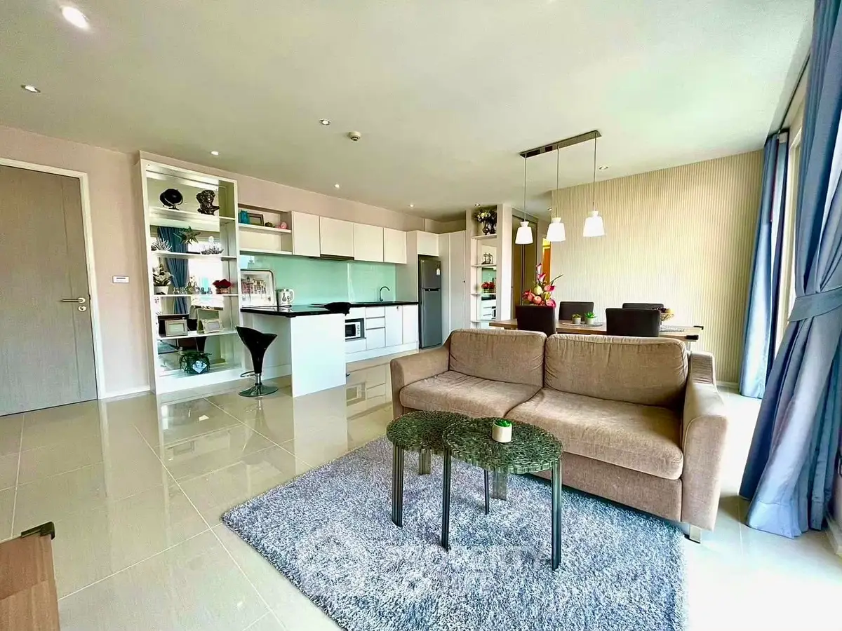 Spacious modern living room with open kitchen and elegant decor