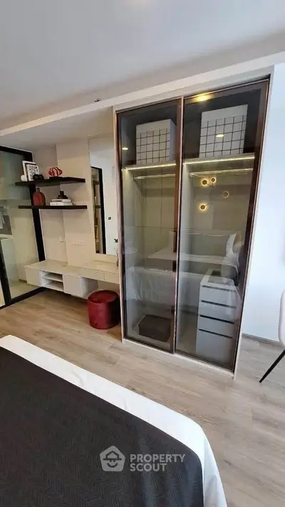 Modern bedroom with sleek wardrobe and stylish decor