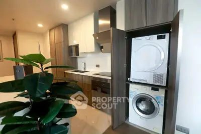 Modern kitchen with integrated appliances and sleek cabinetry