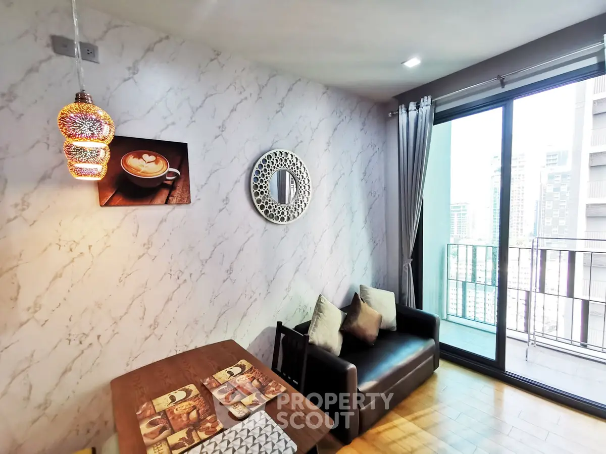 Chic modern living room with marble accent wall and city view balcony