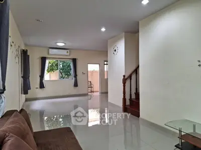 Spacious living room with modern design and natural light