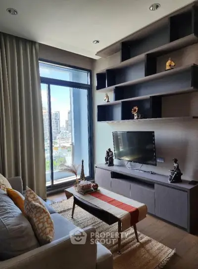 Modern living room with city view, stylish shelving, and cozy decor