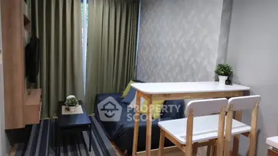 Modern living room with stylish decor and cozy seating area