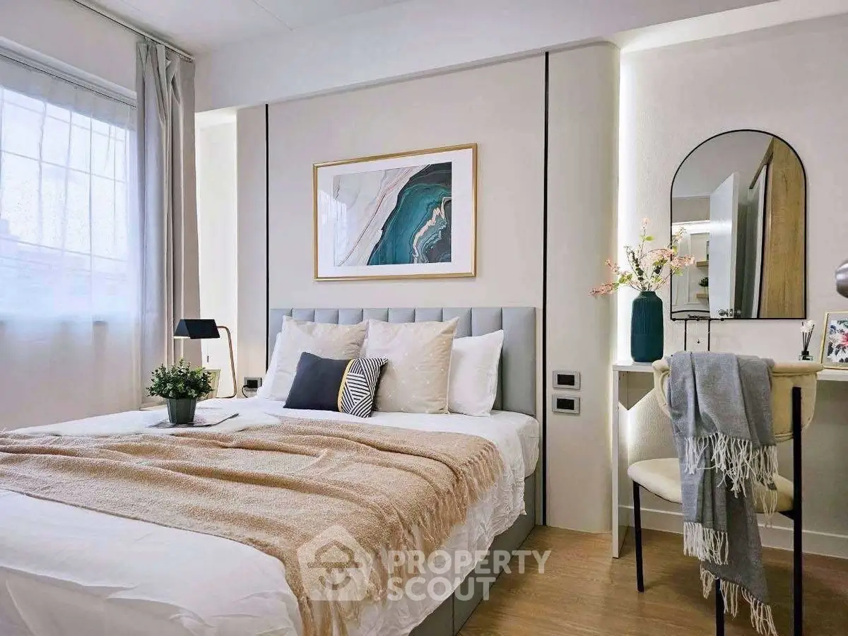 Stylish bedroom with modern decor and cozy ambiance, featuring elegant furniture and soft lighting.