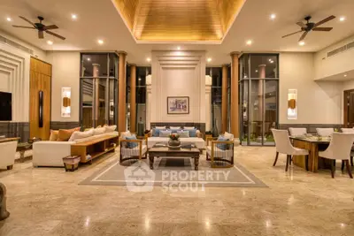 Luxurious spacious living room with high ceilings and elegant decor