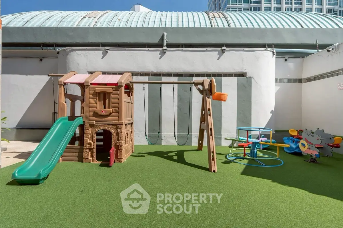 Charming rooftop playground with slide and swings in urban setting