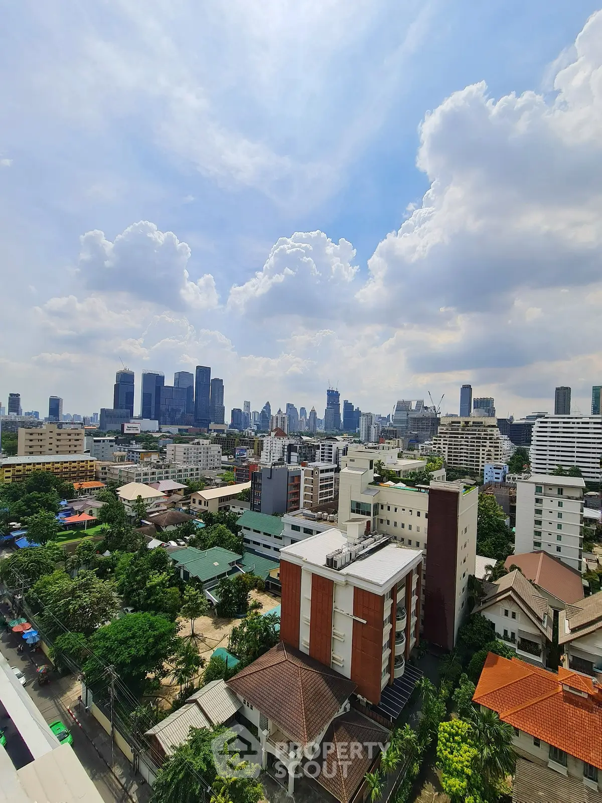 Stunning cityscape view with modern skyline and lush greenery, perfect for urban living enthusiasts.