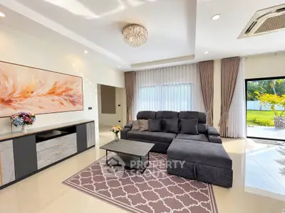 Luxurious living room with elegant decor and garden view