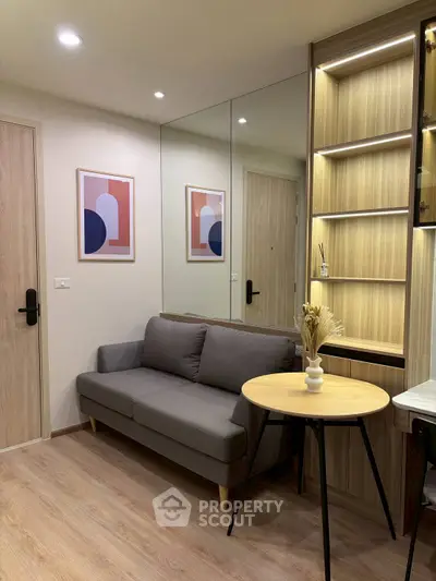 Modern living room with stylish decor and cozy seating area