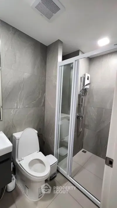 Modern bathroom with sleek shower and contemporary fixtures