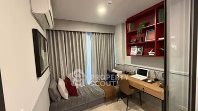 Modern study room with built-in desk, cozy seating, and stylish shelving.