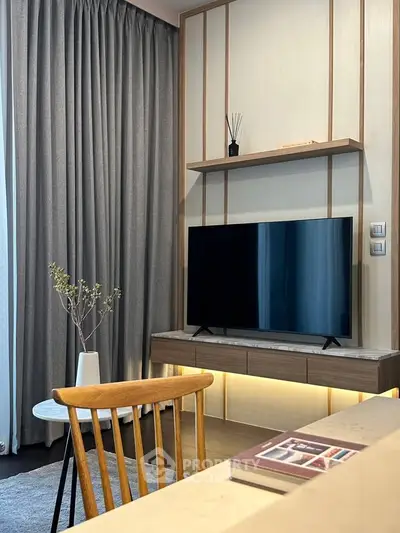 Modern living room with sleek TV unit and elegant decor