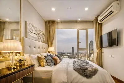 Luxurious bedroom with city view, elegant decor, and modern amenities.
