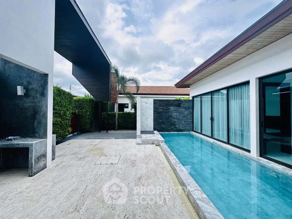 Luxurious modern villa with private pool and sleek architectural design.