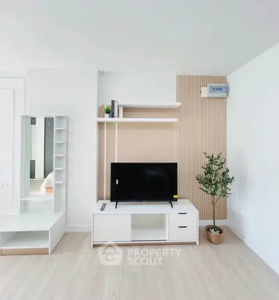 Modern living room with sleek TV stand and minimalist decor