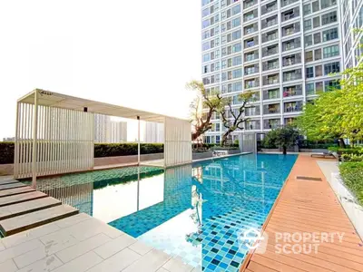 Luxurious condominium with stunning pool and modern architecture