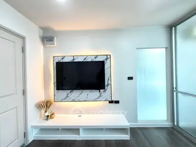 Modern living room with stylish TV wall mount and sleek decor