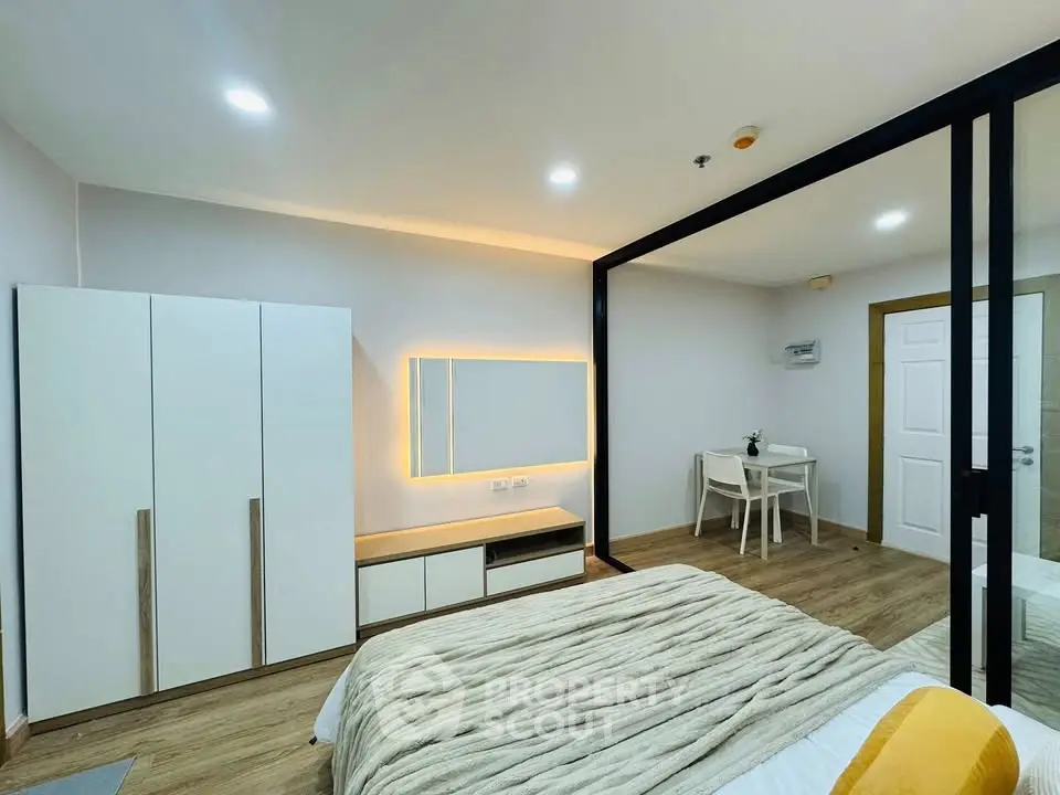 Modern bedroom with stylish decor and cozy ambiance