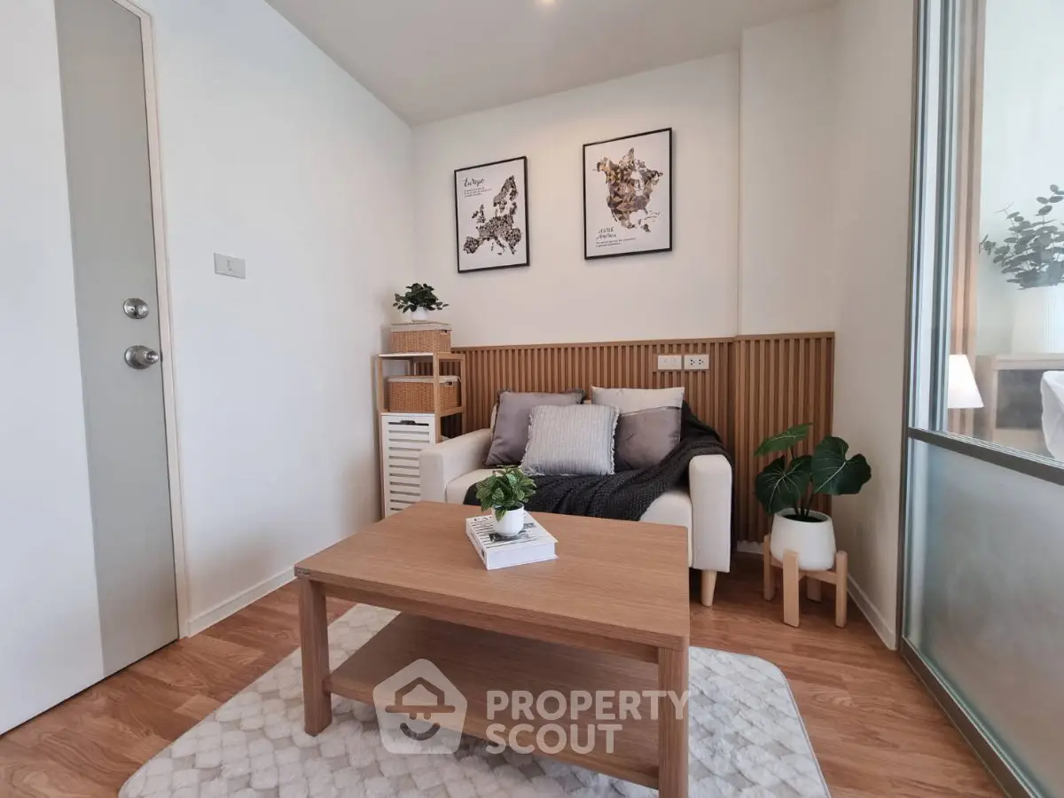 Cozy living room with modern decor and wooden accents, perfect for relaxation.