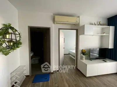 Modern living room with air conditioning and stylish decor