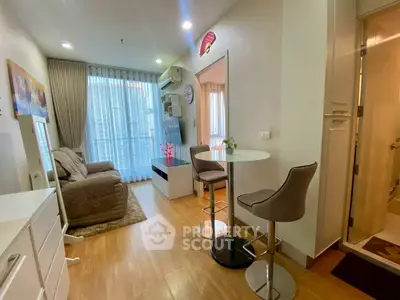 Modern living room with cozy seating and stylish decor in a bright apartment