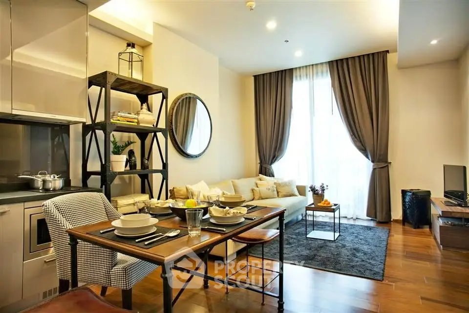 Stylish modern living room with elegant decor and open kitchen layout, perfect for urban living.