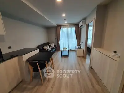 Modern living room with sleek furniture and natural light