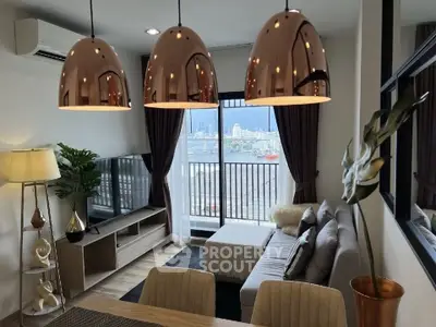 Stylish living room with modern decor and stunning city view from balcony.