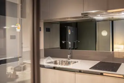 Modern kitchen with sleek design and induction cooktop