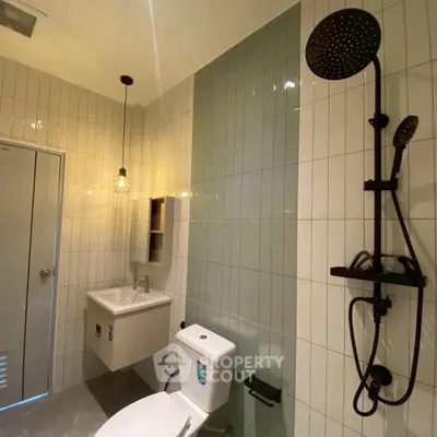 Modern bathroom with sleek shower and stylish lighting