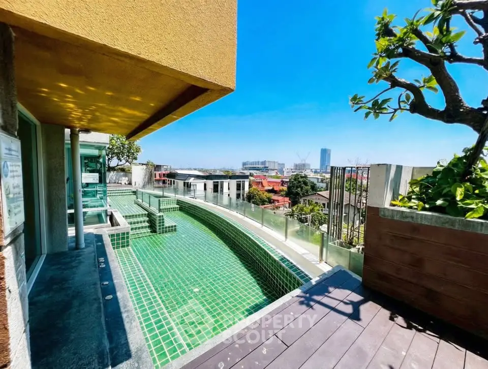 Stunning rooftop pool with panoramic city views and modern design.