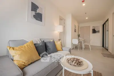 Modern living room with cozy sofa and stylish decor in a bright apartment