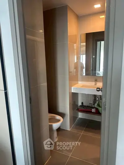 Modern compact bathroom with sleek design and contemporary fixtures