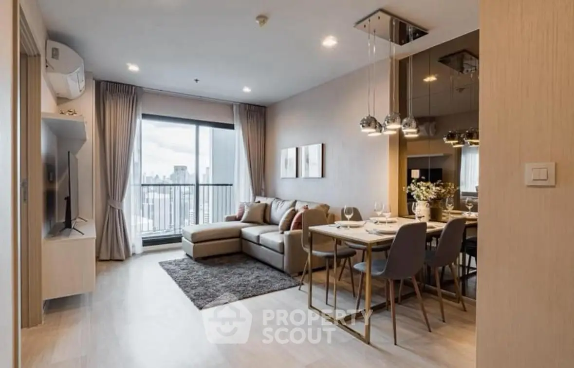 Modern living room with city view, stylish decor, and dining area in open layout.